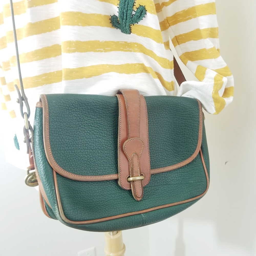 Authentic Dooney & Bourke vintage leather crossbody saddle bags sold separately